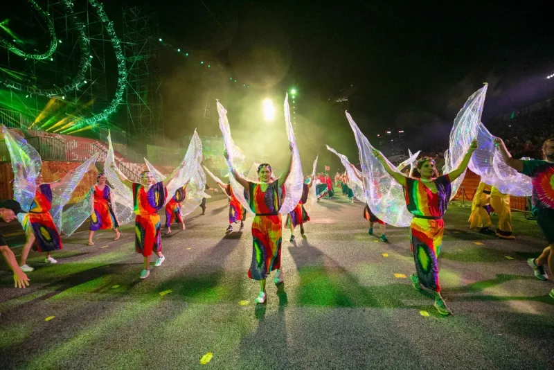 Winged costume performers during a Chingay routine — RS Photography