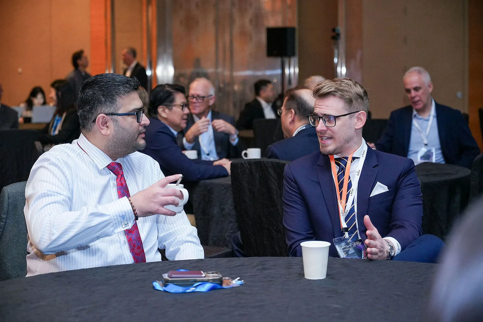 Delegates networking in the foyer outside a Marina Bay Sands ballroom — RS Photography