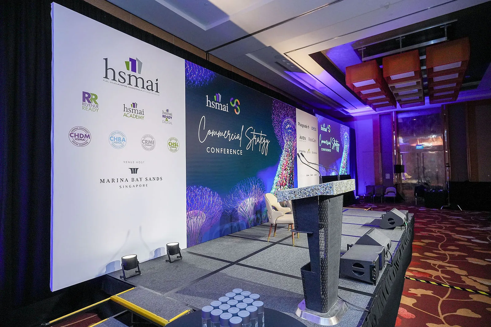 Conference stage and LED backdrop set up in a Marina Bay Sands ballroom for the HSMAI Commercial Strategy Conference — RS Photography